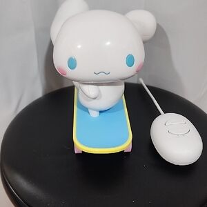 Yellow Toy Car with Pink and Blue Wheels